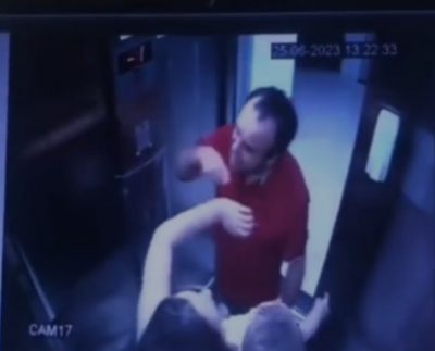 Homem agride mulher com filha no colo dentro de elevador (Foto: Divulgação/Reprodução/Captura de tela/Paraíba Feminina).